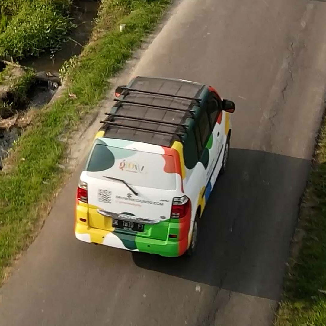 Grow in Kedungu International School Bali shuttle bus – colorful school transportation providing safe and convenient rides for students.